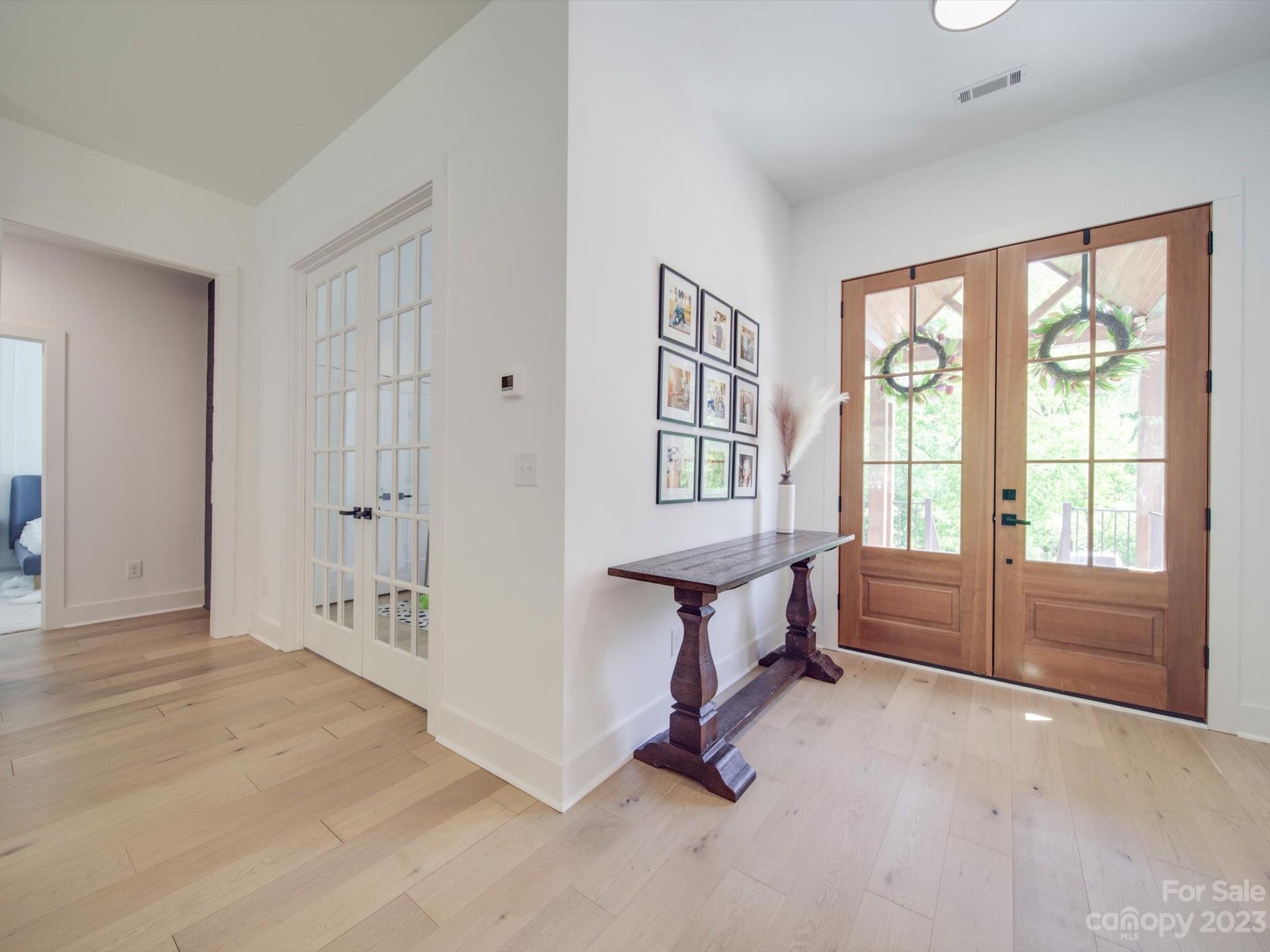 626 Deese Road Monroe, NC 28110 - Photo 11 of 41 wooden floor in an empty room with a window