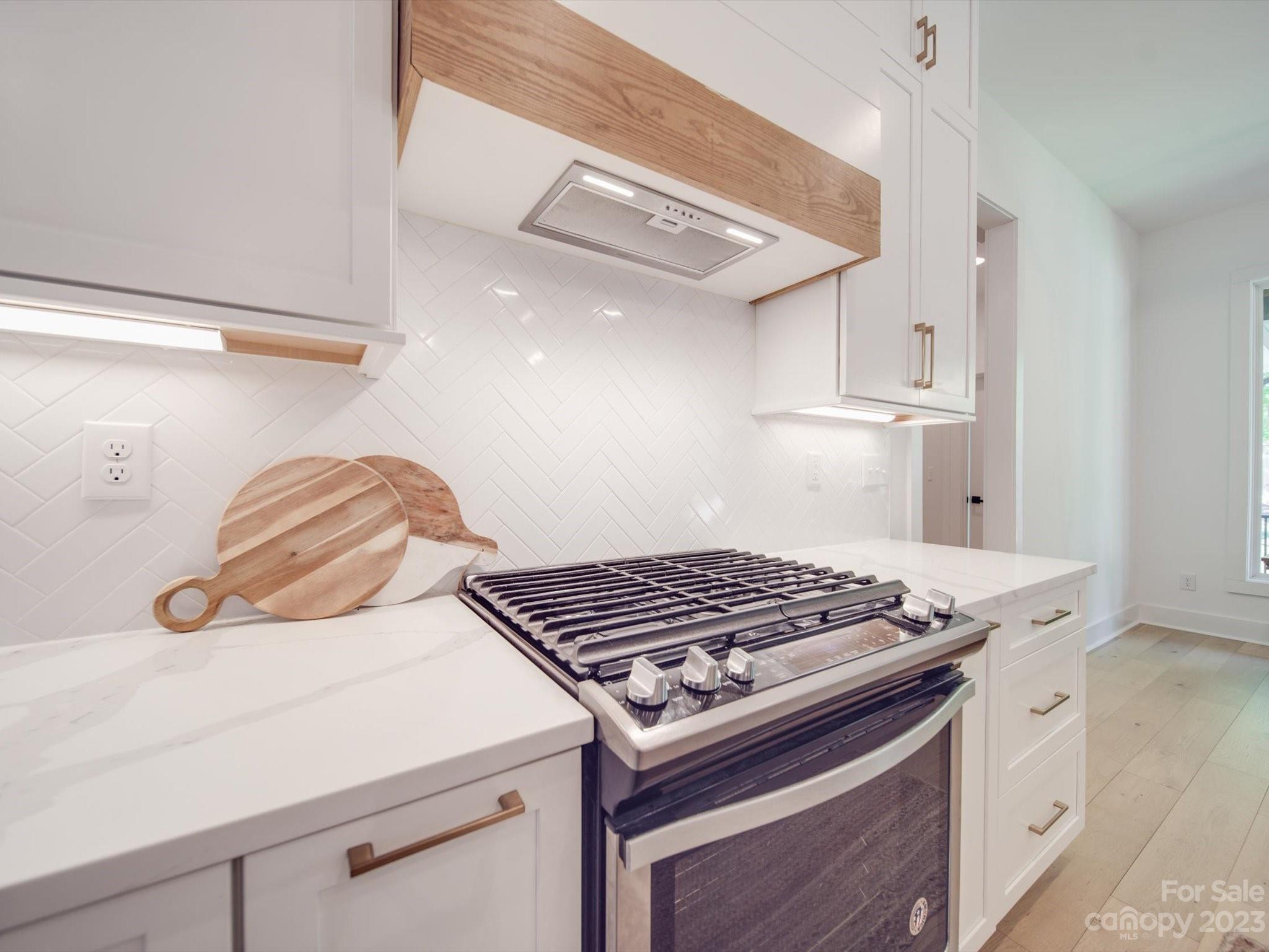 626 Deese Road Monroe, NC 28110 - Photo 16 of 41 a kitchen with stove and cabinets