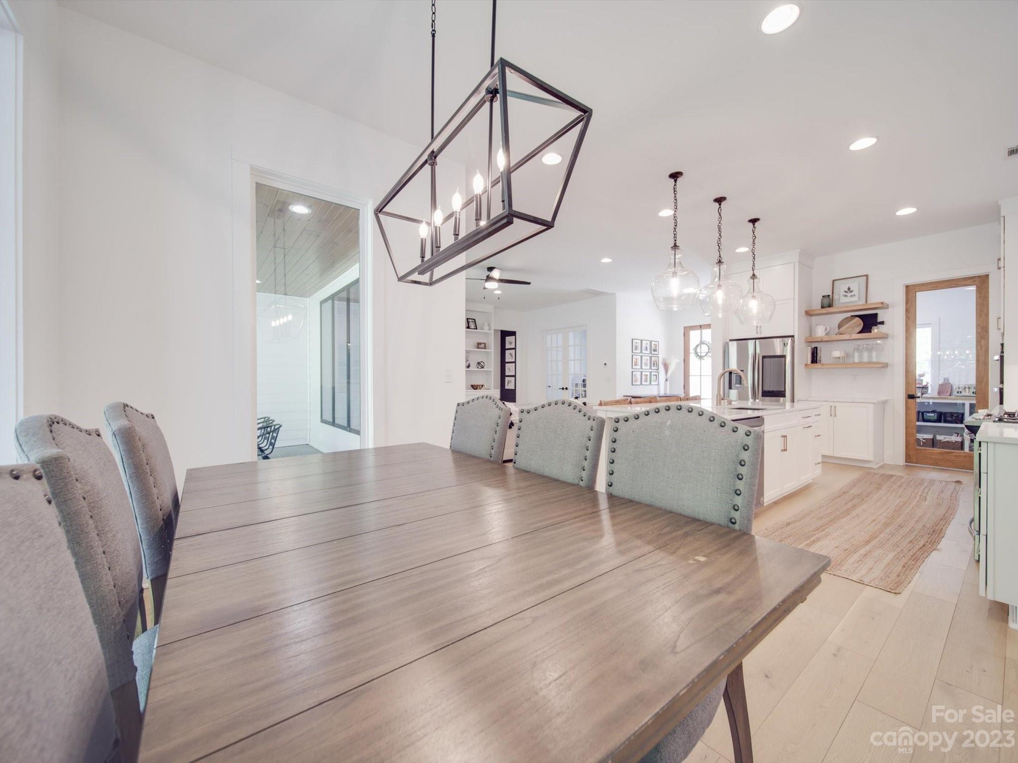 626 Deese Road Monroe, NC 28110 - Photo 22 of 41 a living room with furniture and kitchen view
