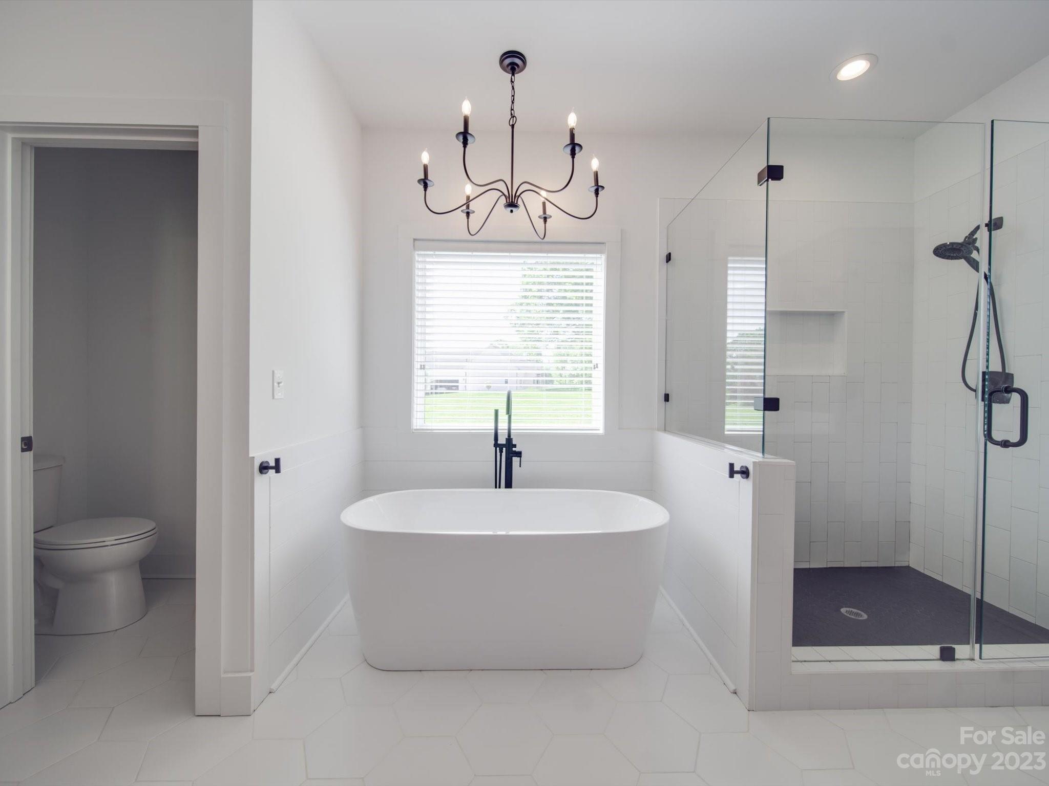 626 Deese Road Monroe, NC 28110 - Photo 26 of 41 a bathroom with a sink a toilet and shower