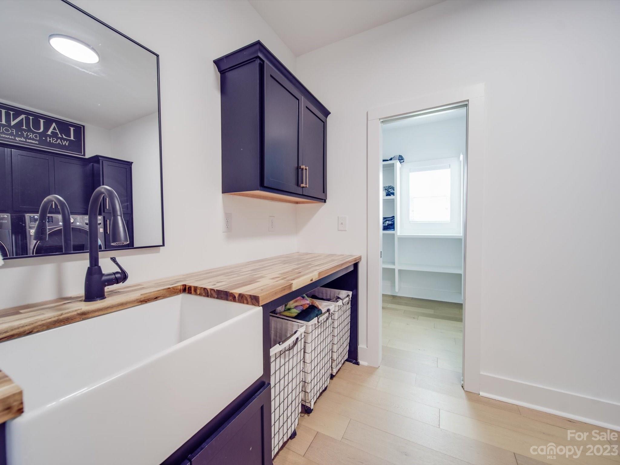 626 Deese Road Monroe, NC 28110 - Photo 33 of 41 a kitchen that has a sink and a stove in it