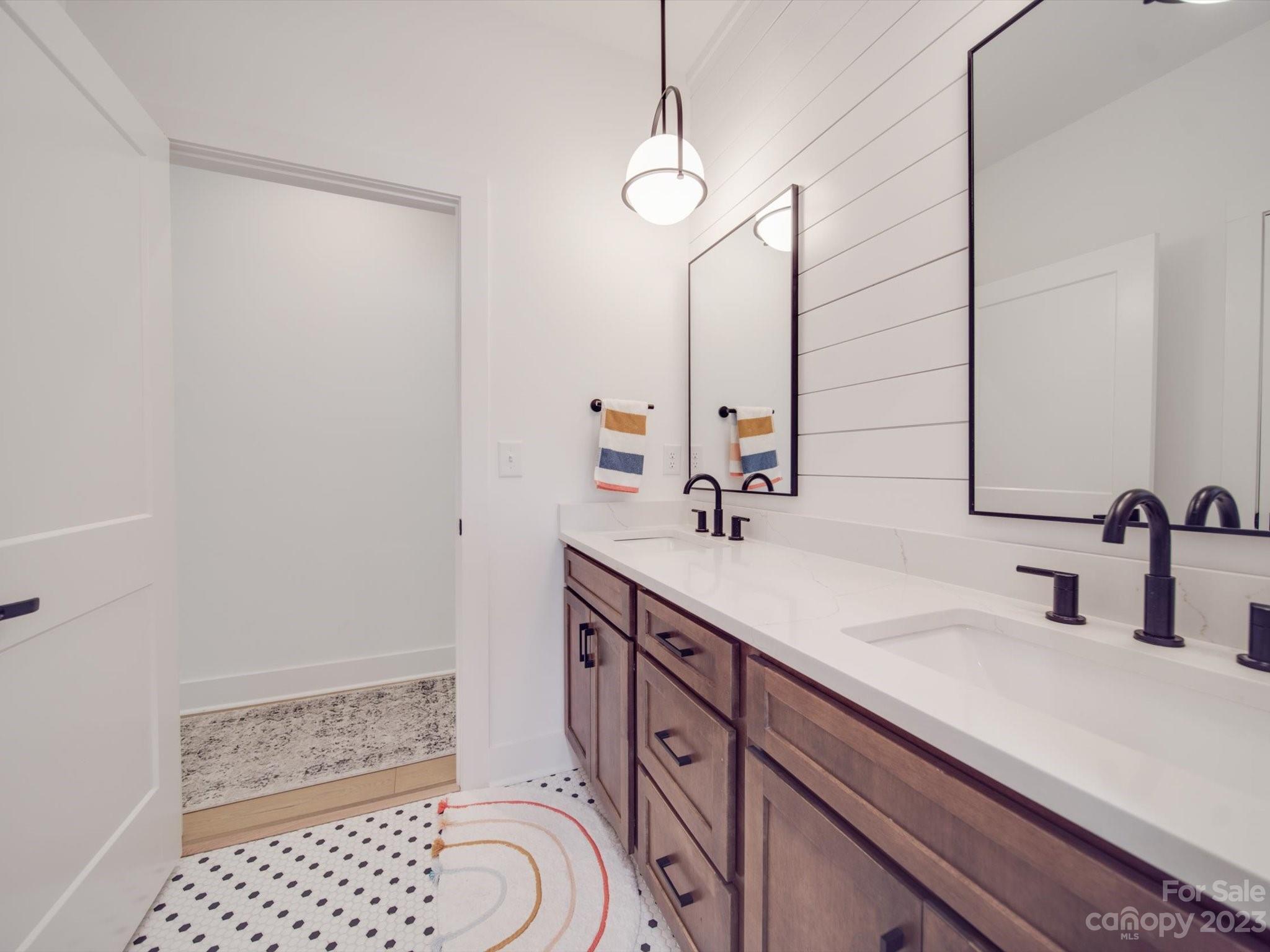 626 Deese Road Monroe, NC 28110 - Photo 37 of 41 a bathroom with a sink a toilet and shower