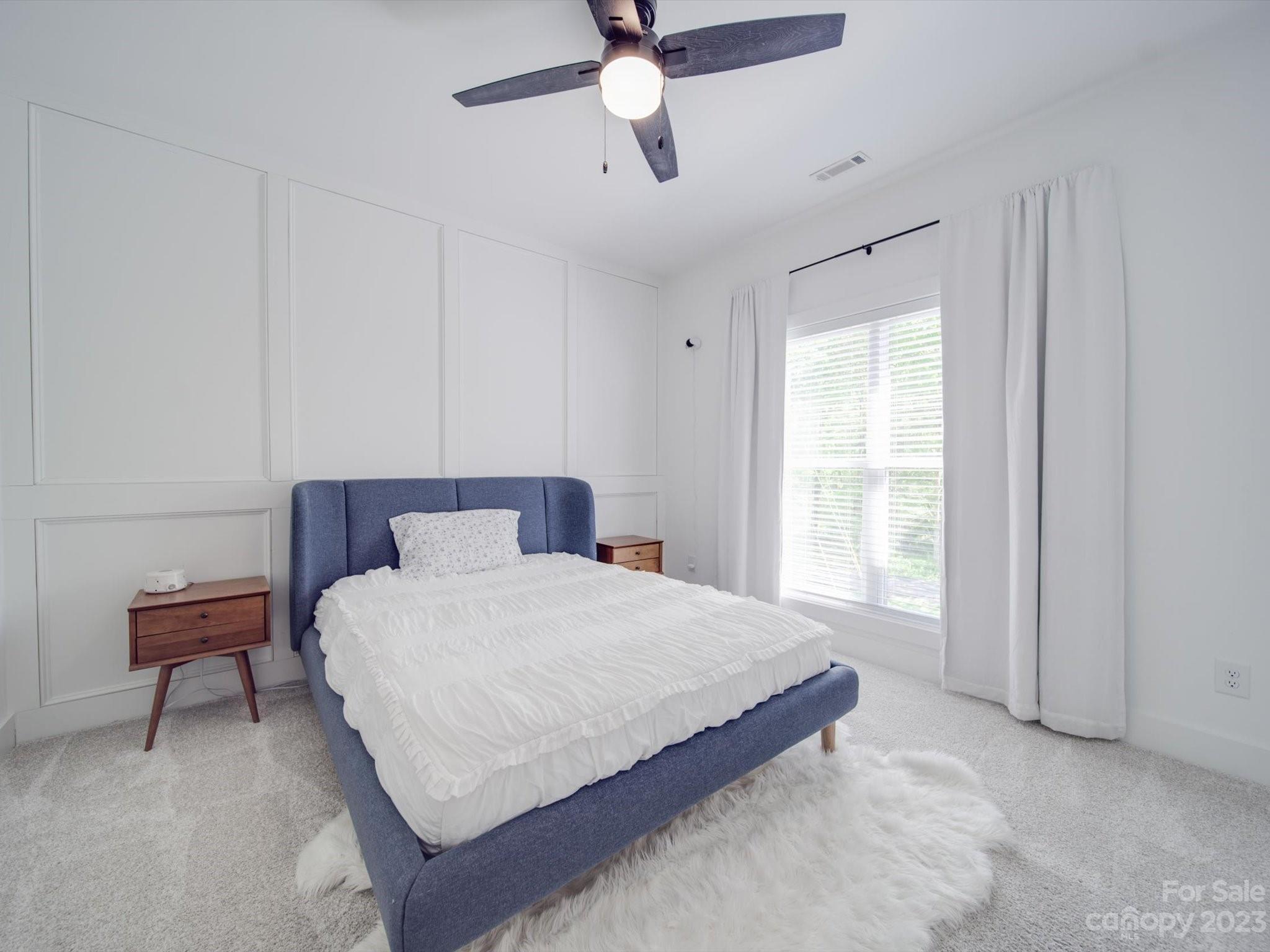 626 Deese Road Monroe, NC 28110 - Photo 40 of 41 a bedroom with a bed and window