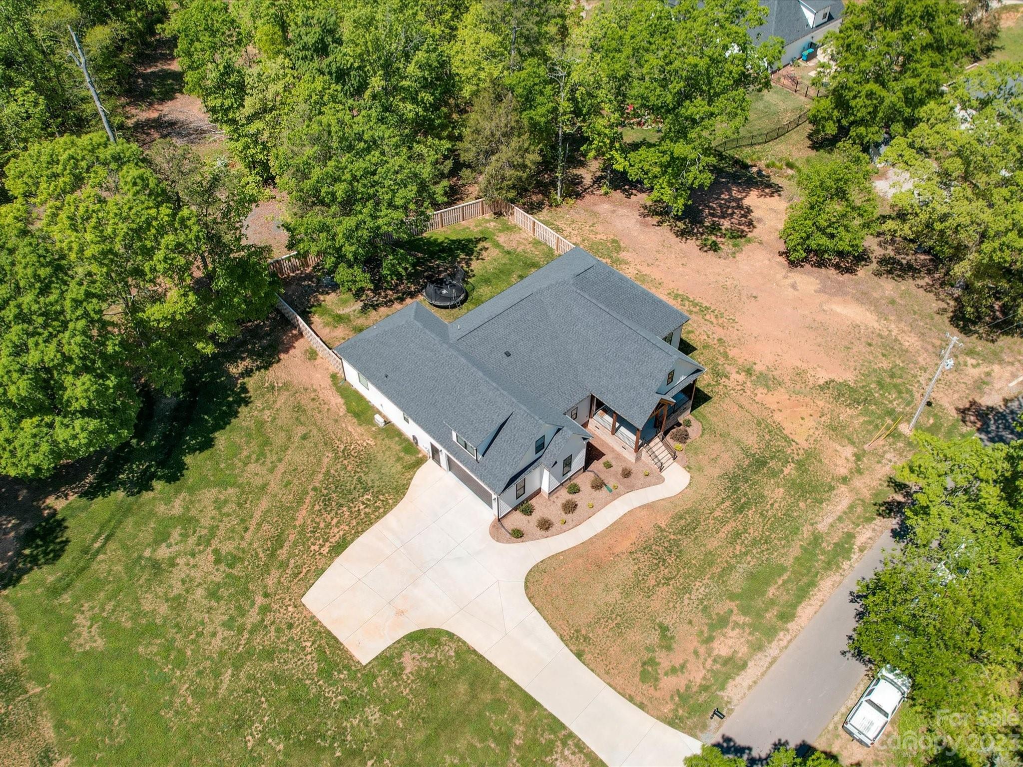 626 Deese Road Monroe, NC 28110 - Photo 6 of 41 an aerial view of a house with a yard and large tree