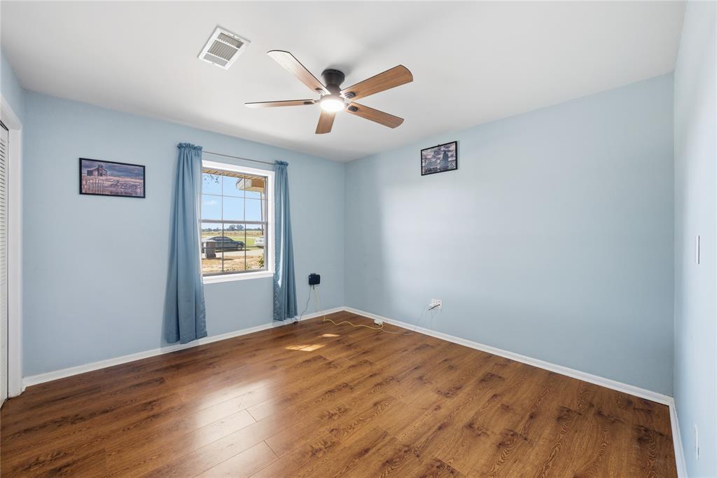 12985 County Road 4331 Larue, TX 75770 - Photo 17 of 23 a view of empty room with wooden floor