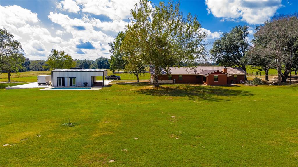 12985 County Road 4331 Larue, TX 75770 - Photo 2 of 23 a view of a house with a big yard