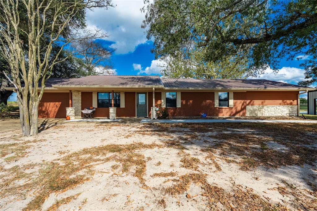 12985 County Road 4331 Larue, TX 75770 - Photo 8 of 23 a front view of a house with a yard