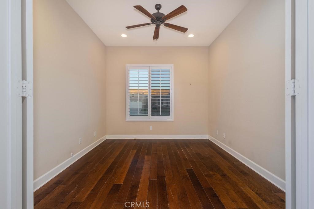 1647 Via Rojas Hemet, CA 92545 - Photo 13 of 29 wooden floor in an empty room with a window