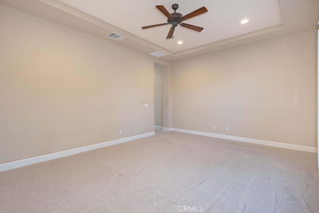 1647 Via Rojas Hemet, CA 92545 - Photo 16 of 29 an empty room with a window and a fan