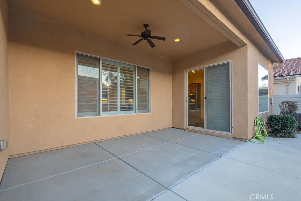 1647 Via Rojas Hemet, CA 92545 - Photo 26 of 29 a view of an empty room with a ceiling fan and window