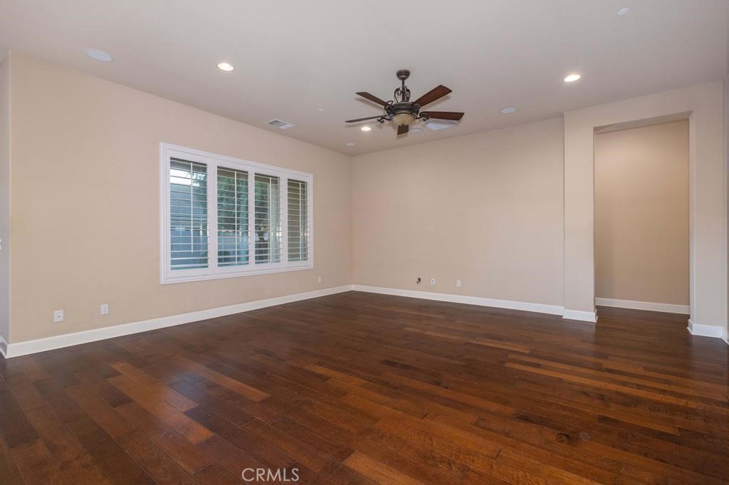 1647 Via Rojas Hemet, CA 92545 - Photo 10 of 29 a view of an empty room with wooden floor and a window