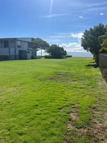 a view of yard with swimming pool and outdoor space