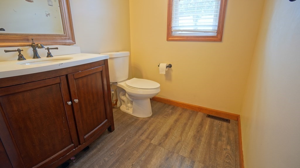 142 Avery Street Springfield, MA 01119 - Photo 13 of 27 a bathroom with a sink and a toilet