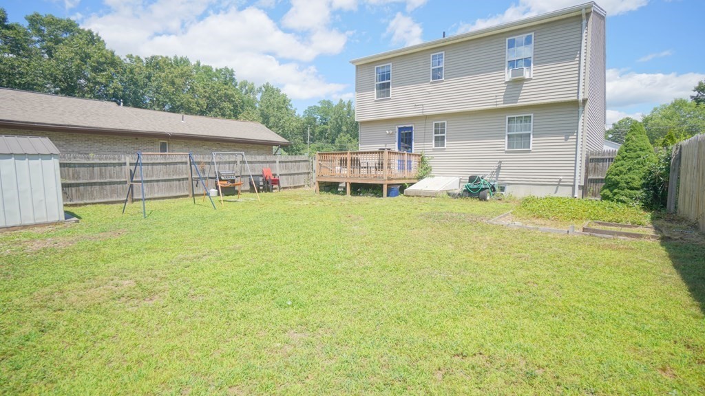142 Avery Street Springfield, MA 01119 - Photo 26 of 27 a view of a house with pool and a yard