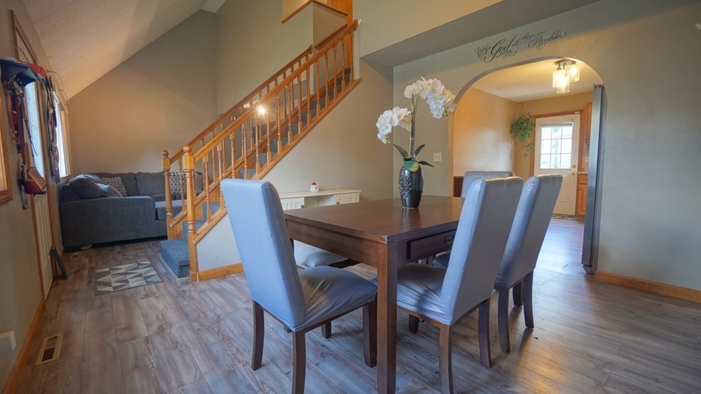 142 Avery Street Springfield, MA 01119 - Photo 4 of 27 a view of a dining room with furniture and a chandelier