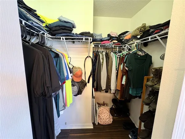 a view of street with parked cars