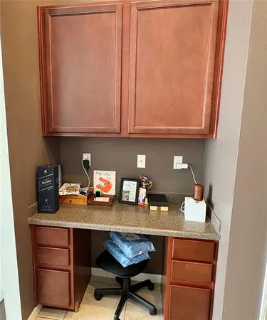 a room with a table and chairs