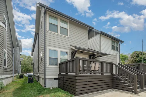a front view of a house with glass windows