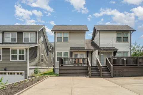 an aerial view of a city with lots of residential buildings