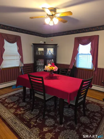 a kitchen with sink a stove and cabinets