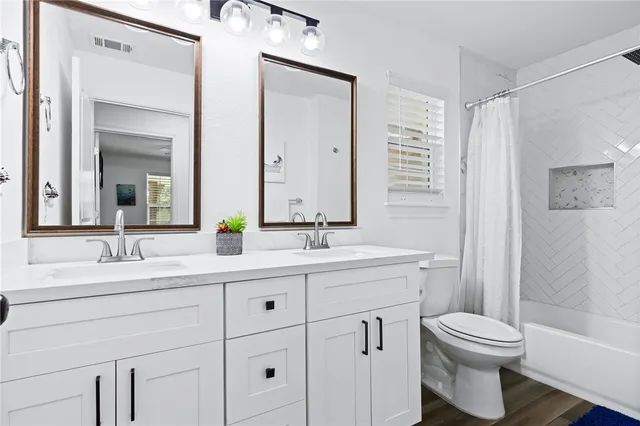 an aerial view of a house with outdoor space garden and street view