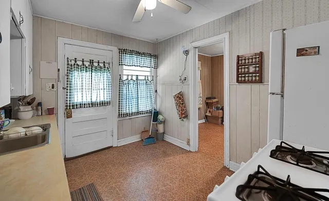 a bed room with a bed and a window