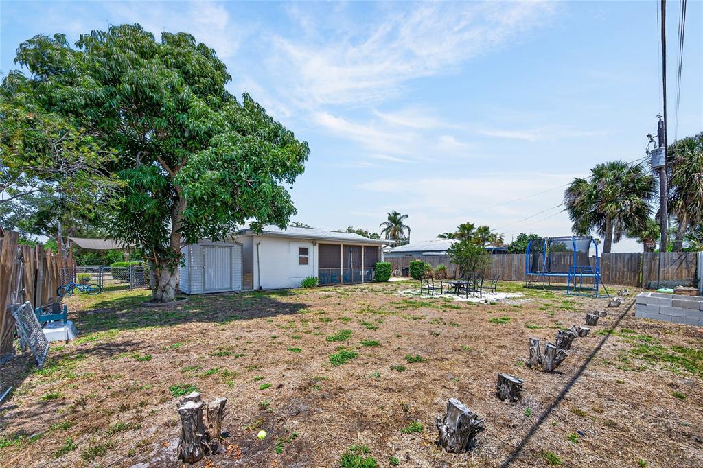 532 Center Road Venice, FL 34285 - Photo 53 of 68 a view of backyard of the house