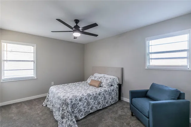 a bedroom with a bed and furniture