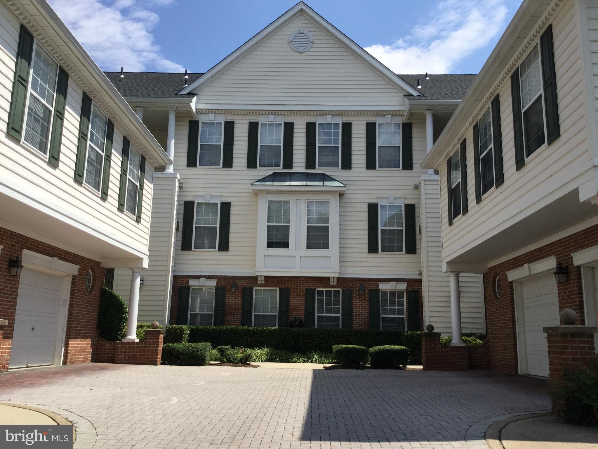 25252 Riffleford Square, Unit 103 Chantilly, VA 20152 - Photo 1 of 20 Front courtyard