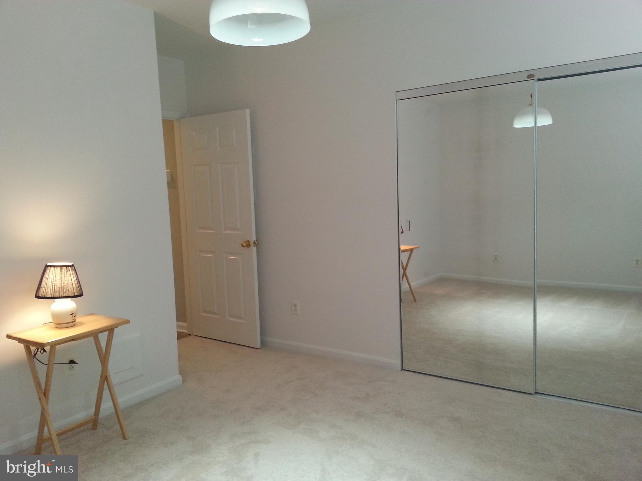 25252 Riffleford Square, Unit 103 Chantilly, VA 20152 - Photo 12 of 20 Mirrored closet doors