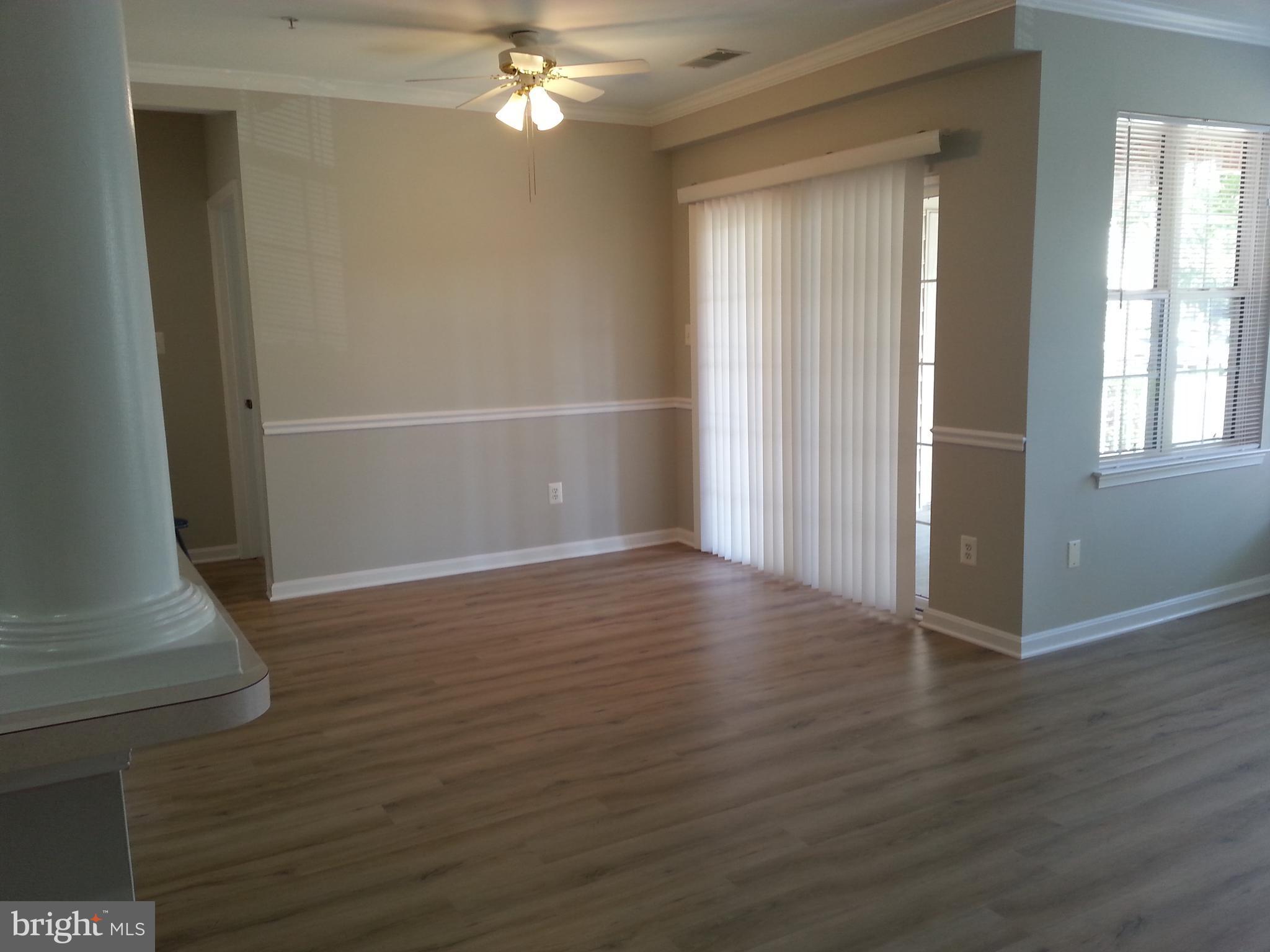 25252 Riffleford Square, Unit 103 Chantilly, VA 20152 - Photo 6 of 20 Sliders to private patio on ground level