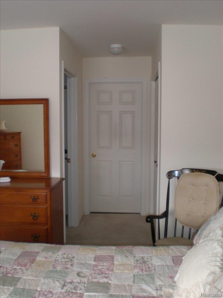 1219 Crystal Pointe Circle, Unit 48 Fenton, MI 48430 - Photo 21 of 25 Master BR to Bath