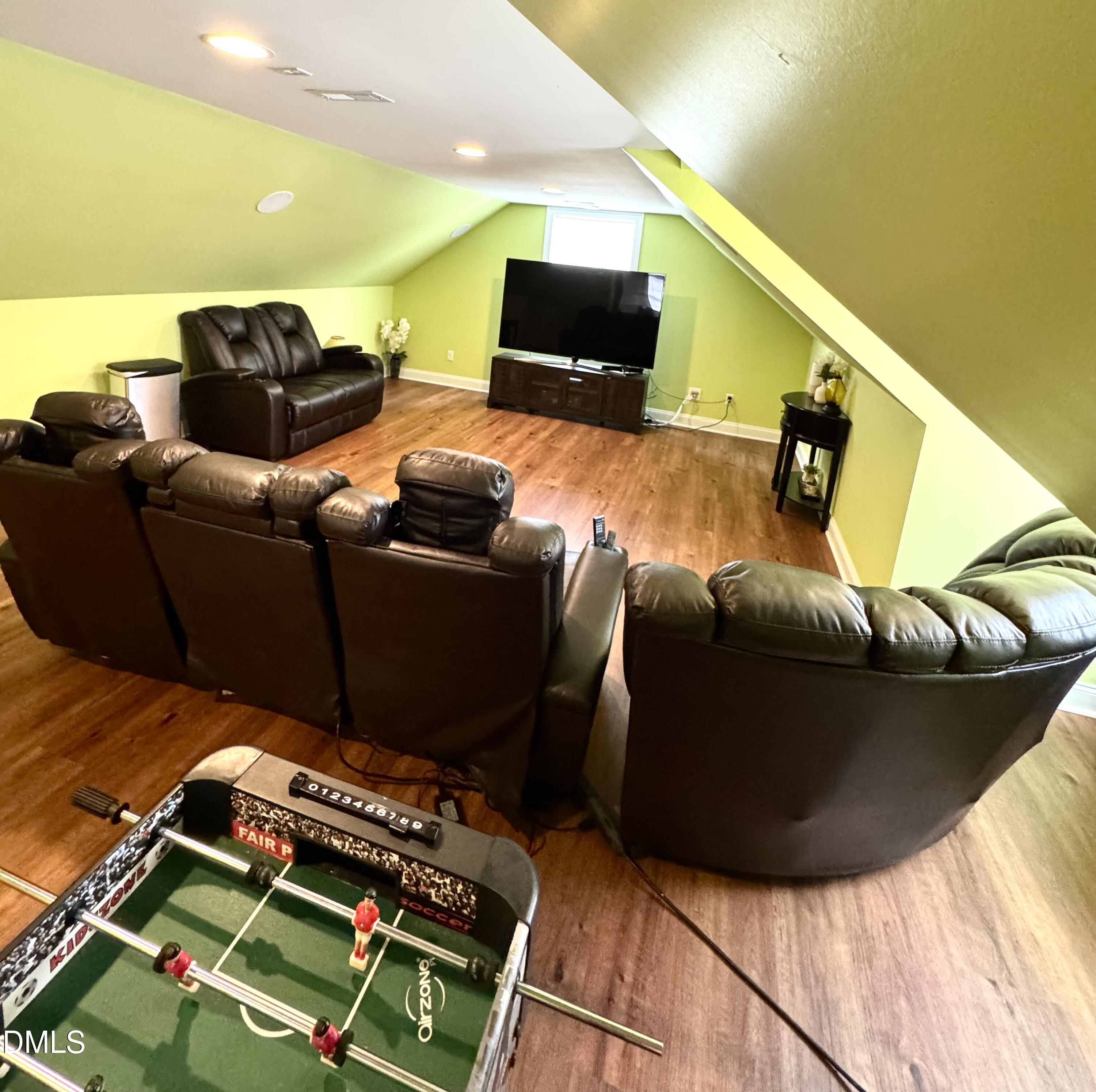 640 Tart Town Road Dunn, NC 28334 - Photo 49 of 71 a living room with furniture and a flat screen tv