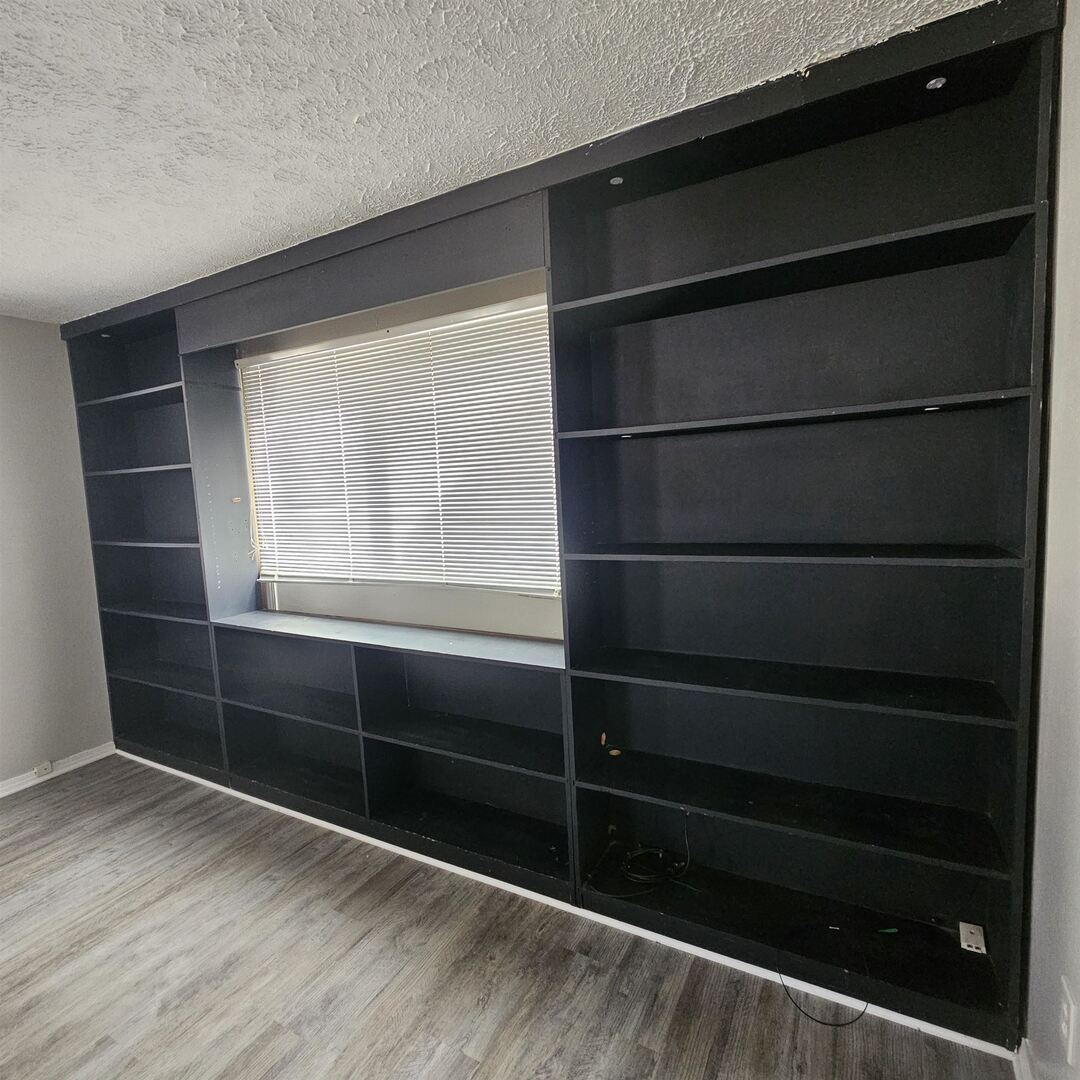 609 Airport Road Mount Vernon, IL 62864 - Photo 12 of 27 a view of walk in closet with empty racks