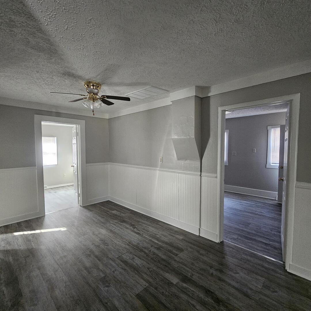 609 Airport Road Mount Vernon, IL 62864 - Photo 15 of 27 a view of empty room with wooden floor