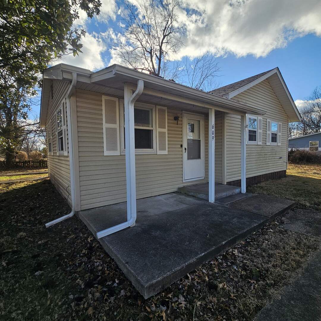 609 Airport Road Mount Vernon, IL 62864 - Photo 2 of 27 a view of a house with a yard