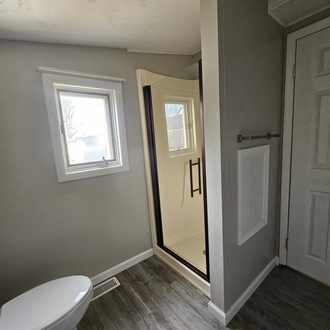 609 Airport Road Mount Vernon, IL 62864 - Photo 25 of 27 a bathroom with a toilet