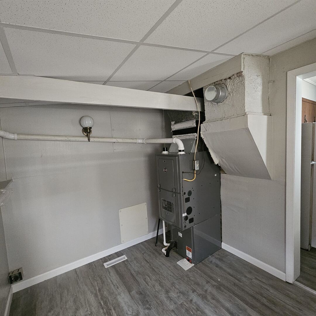 609 Airport Road Mount Vernon, IL 62864 - Photo 26 of 27 a view of empty room with wooden floor