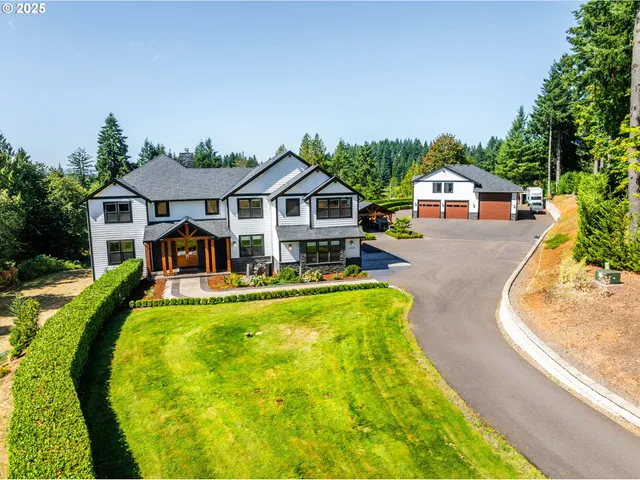 swimming pool view with a seating space and a garden view