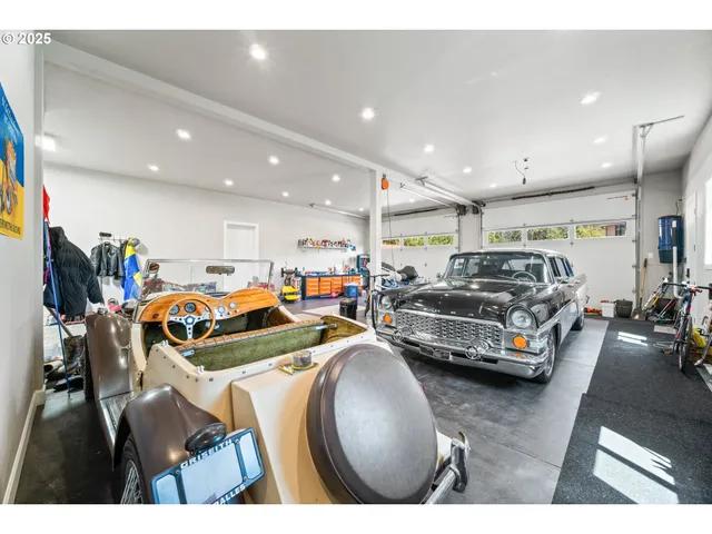 a room with lots of furniture and a chandelier