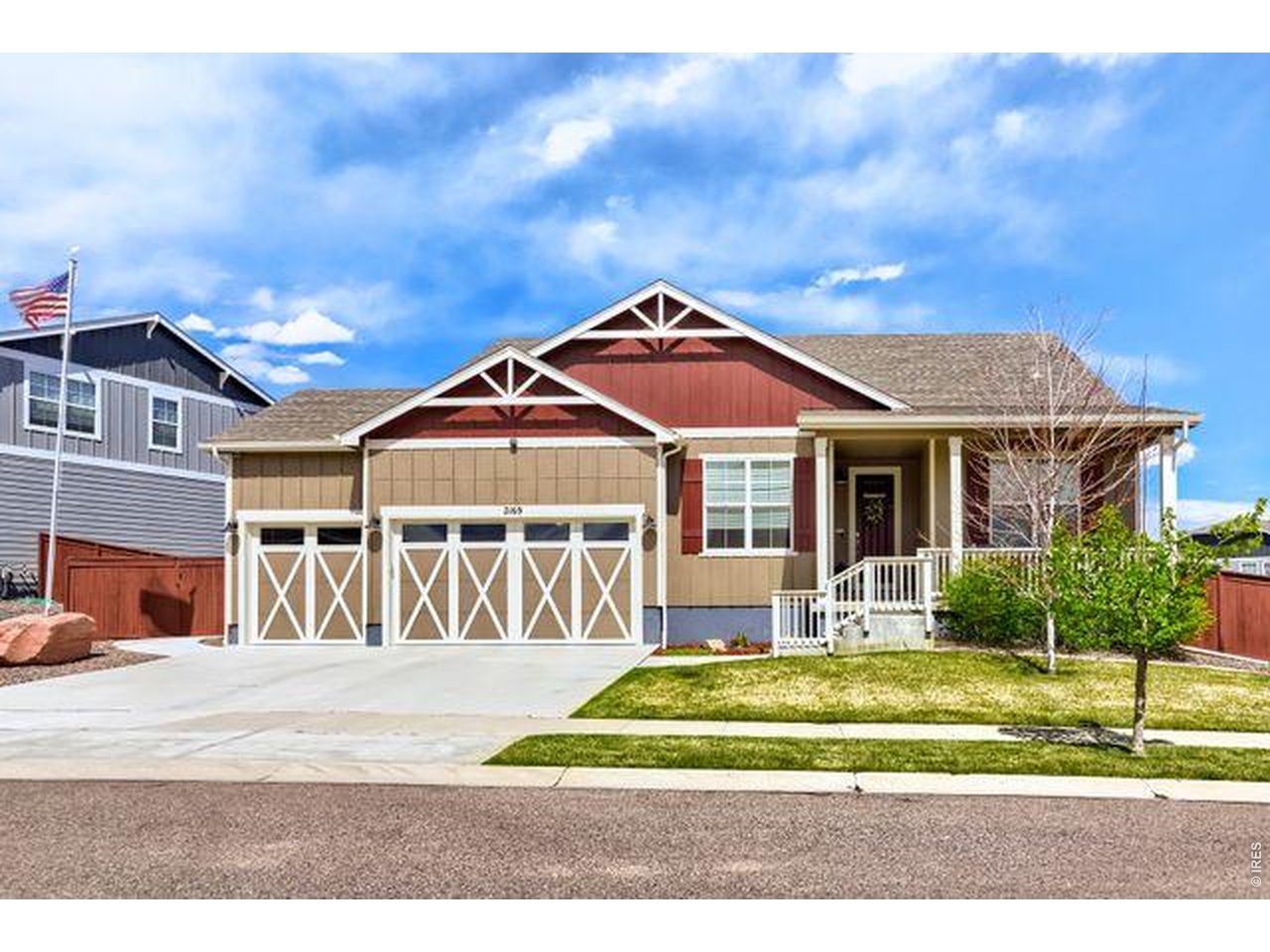 2169 Day Spring Drive Windsor, CO 80550 - Photo 1 of 39 a front view of a house with a yard