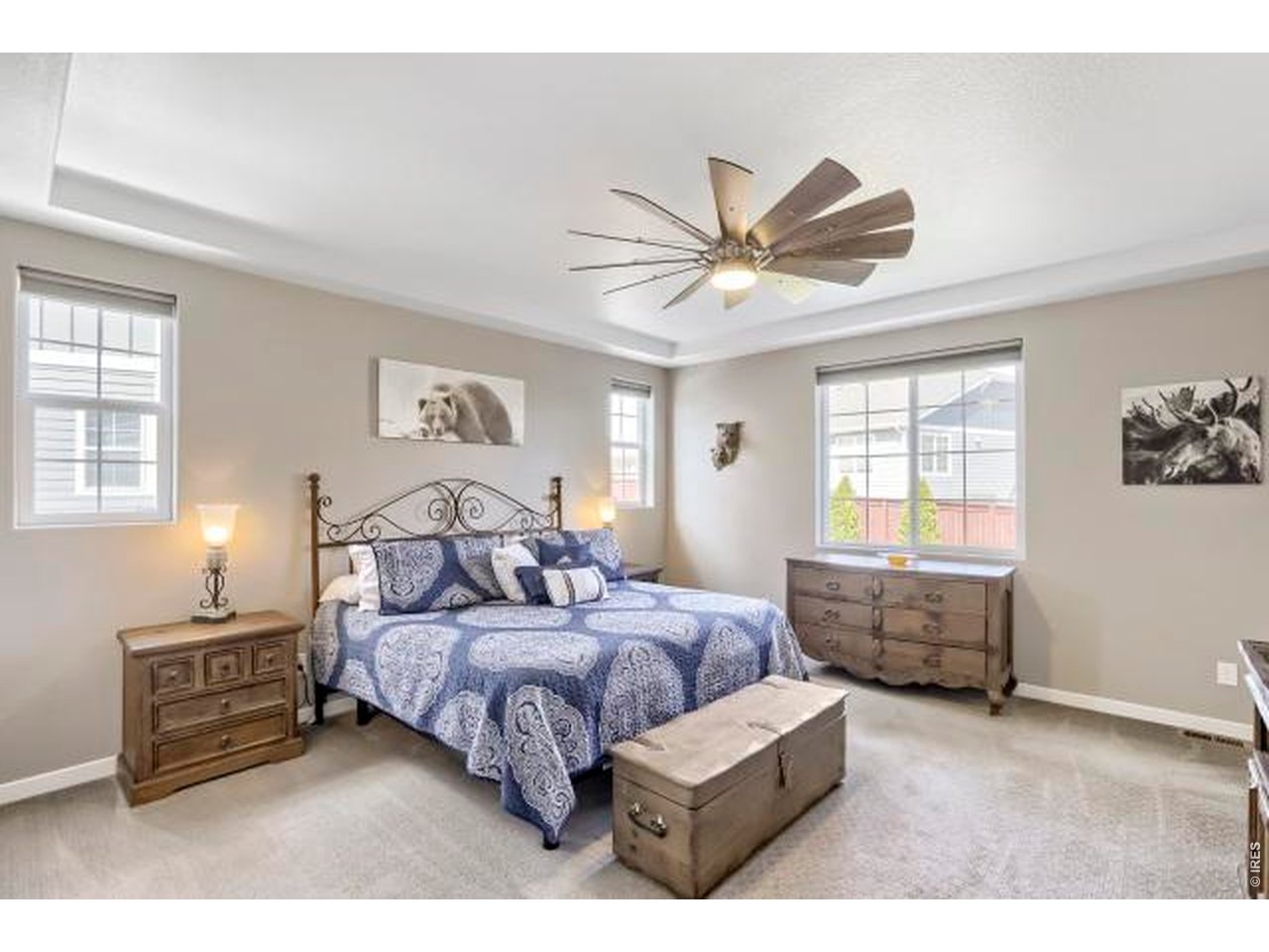 2169 Day Spring Drive Windsor, CO 80550 - Photo 11 of 39 a bedroom with a bed couch and window