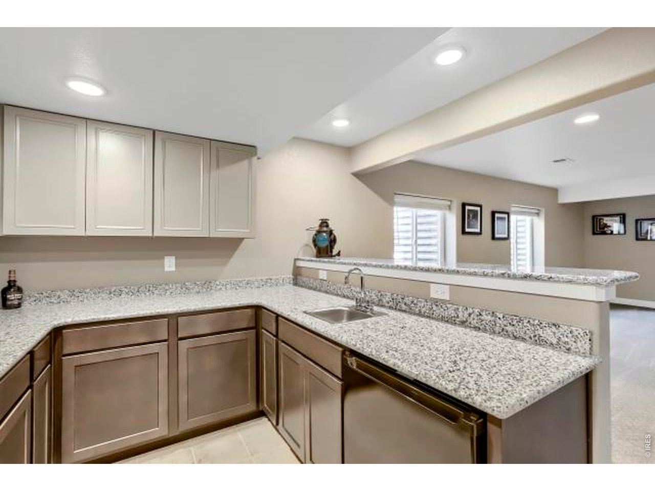 2169 Day Spring Drive Windsor, CO 80550 - Photo 21 of 39 a kitchen with a sink and cabinets