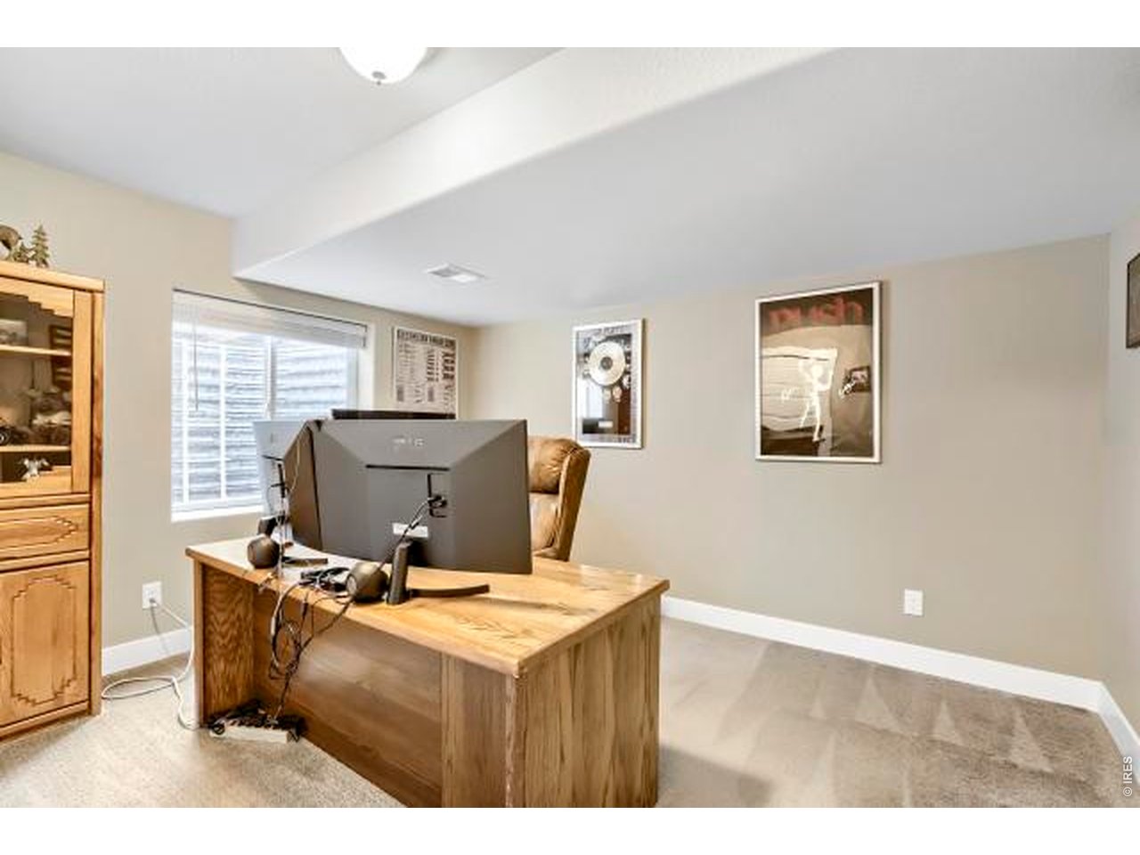 2169 Day Spring Drive Windsor, CO 80550 - Photo 22 of 39 a view of workspace with wooden floor windows