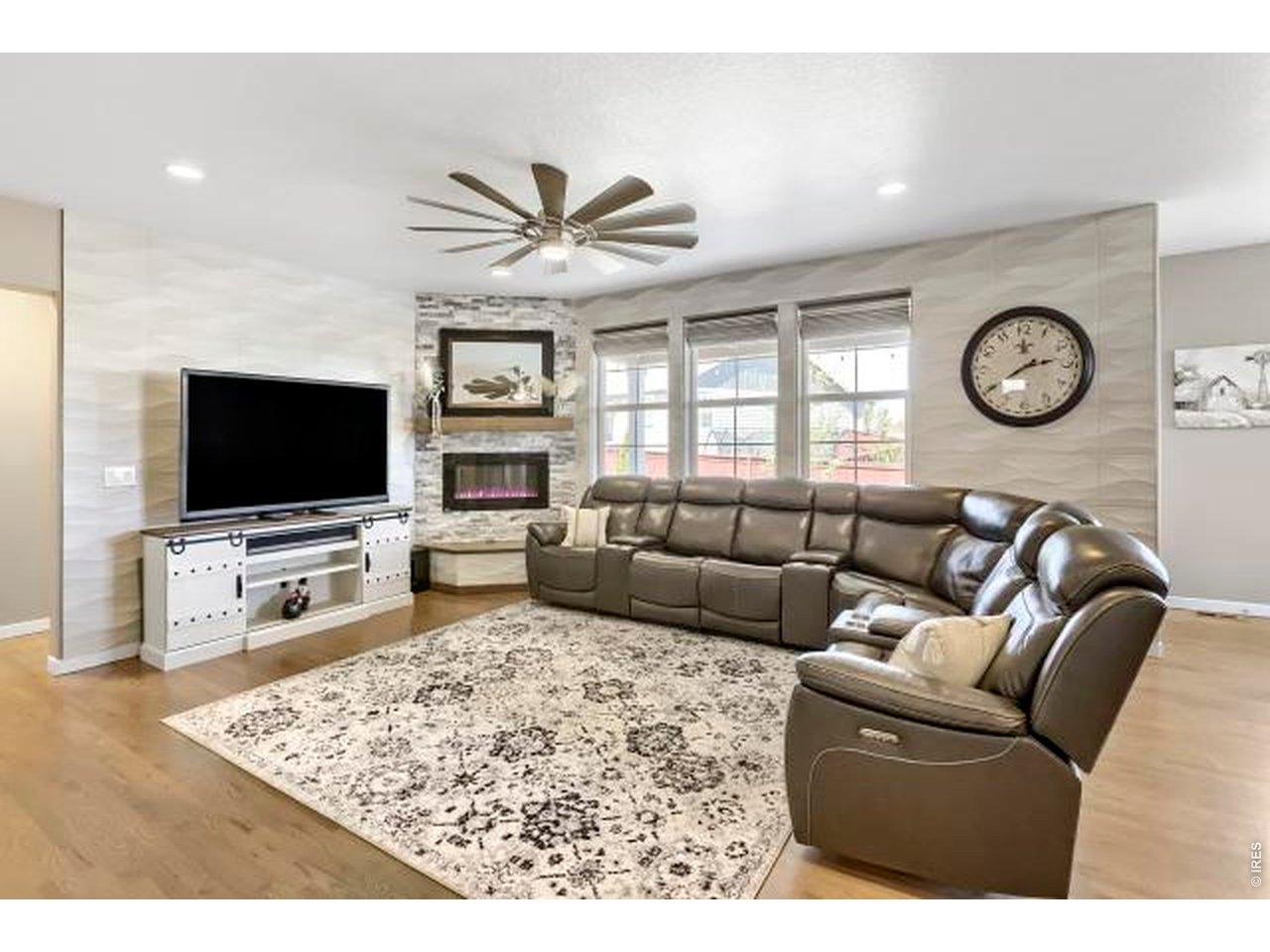 2169 Day Spring Drive Windsor, CO 80550 - Photo 4 of 39 a living room with furniture and a flat screen tv