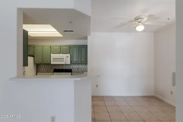 a bathroom with a sink a mirror and a light fixture
