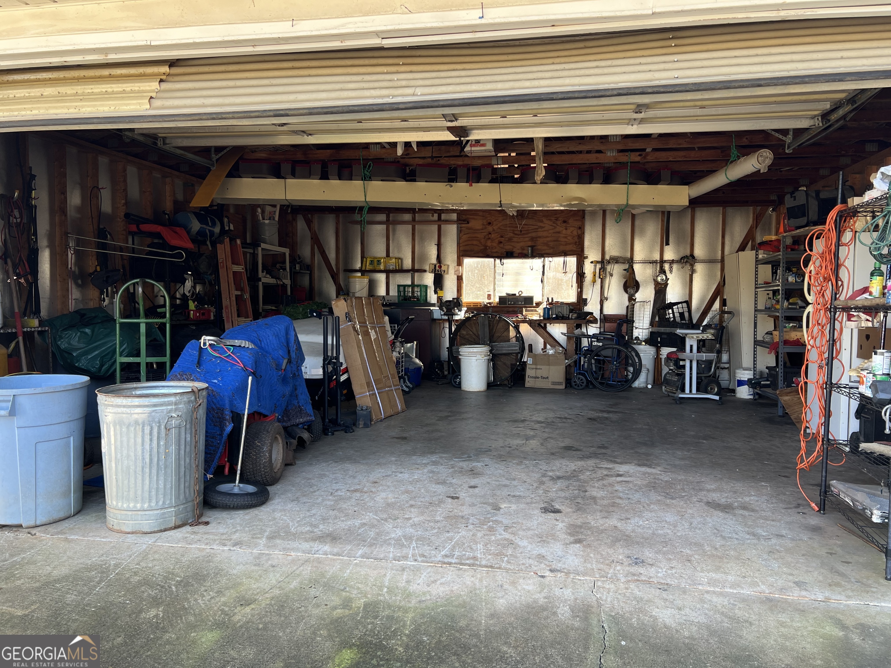 1567 Locust Grove Road Locust Grove, GA 30248 - Photo 15 of 33 a view of a storage room with a lot of stuff