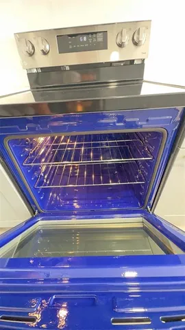 a view of a room that has a fireplace