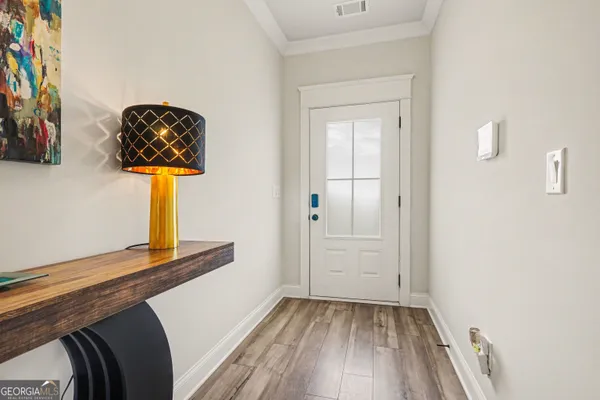 a view of small space with wooden floor
