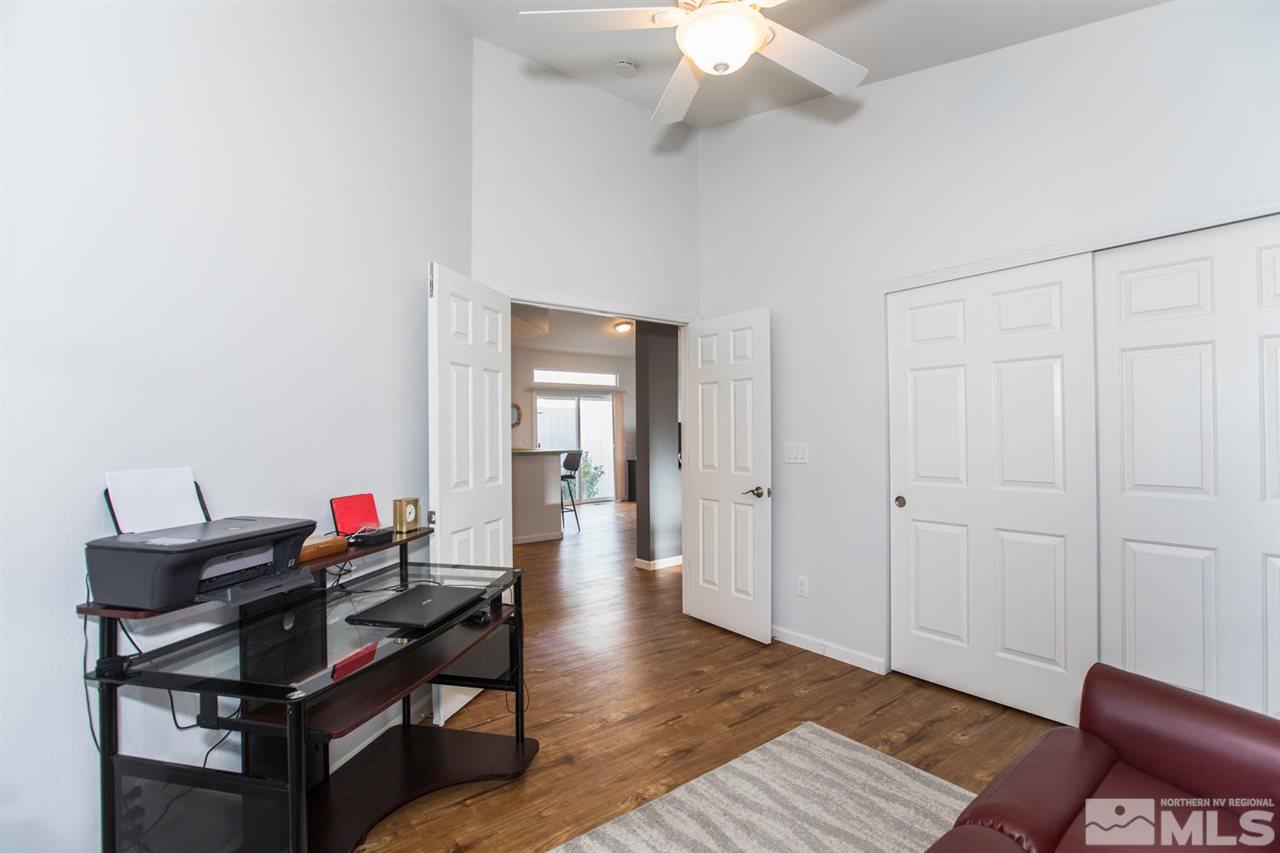 700 Caughlin Glen Reno, NV 89519 - Photo 15 of 25 a living room with furniture and wooden floor